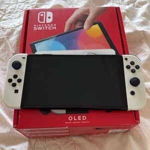 Nintendo Switch OLED with White and Black Joy-Cons